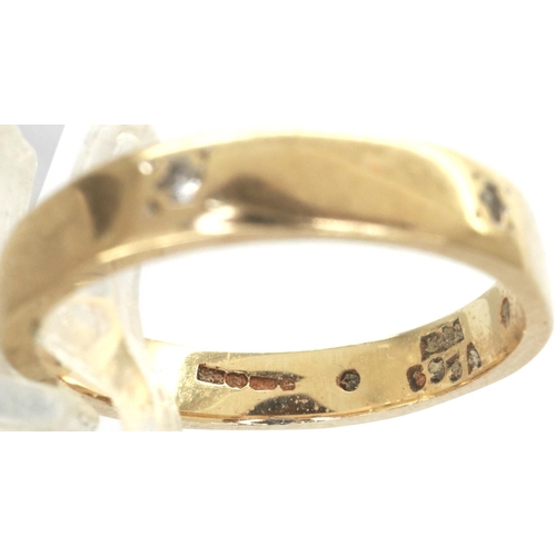 82 - 9ct gold diamond set hexagonal band ring, size M, 2.5g. P&P Group 1 (£14+VAT for the first lot and £... 