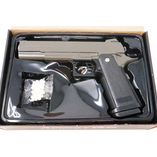 2105 - New old stock airsoft pistol, model V19 brown, boxed. P&P Group 1 (£14+VAT for the first lot and £1+... 