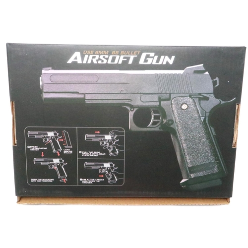 2105 - New old stock airsoft pistol, model V19 brown, boxed. P&P Group 1 (£14+VAT for the first lot and £1+... 