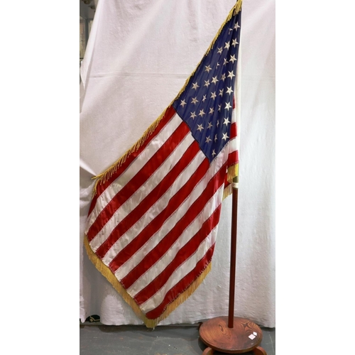 2168 - 20th century American flag, on standard with turned oak base, H: 200 cm. Not available for in-house ... 