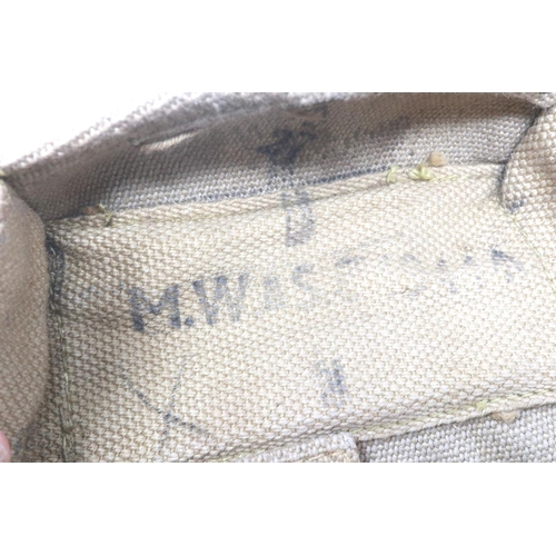 2194 - Webbing: 1944 pattern khaki webbing pouches and straps. P&P Group 1 (£14+VAT for the first lot and £... 