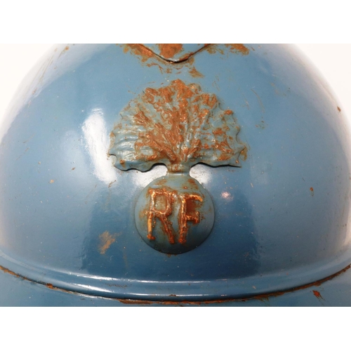 2216 - WWI French small size M15 Adrian helmet with liner, badged to infantry. P&P Group 3 (£25+VAT for the... 