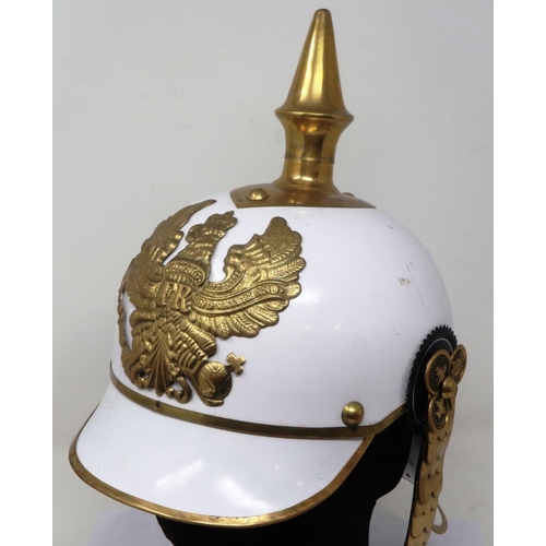 2221 - Replica German Pickelhaube in enamelled metal and brass, with liner. P&P Group 3 (£25+VAT for the fi... 