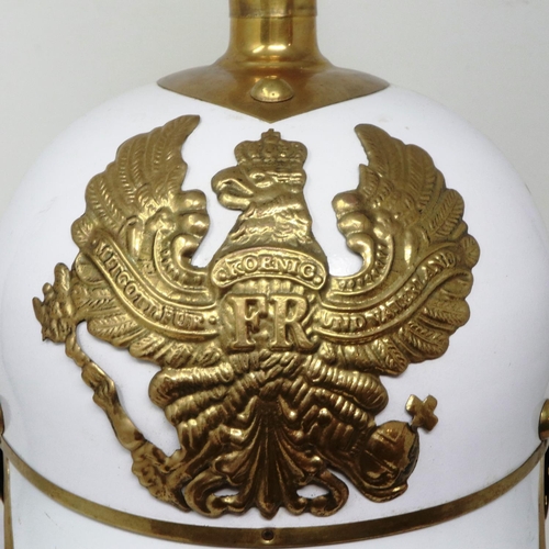 2221 - Replica German Pickelhaube in enamelled metal and brass, with liner. P&P Group 3 (£25+VAT for the fi... 