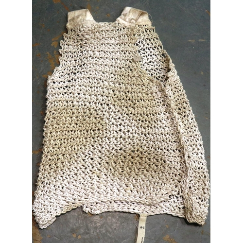 2241 - WWII 1942 Dated British Escape and Evasion Survival String Vest, made from one continuous string whi... 