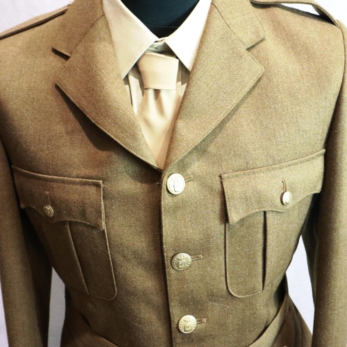 2245 - American post-war military dress uniform, comprising tunic, trousers, visor cap, shirt and tie, some... 