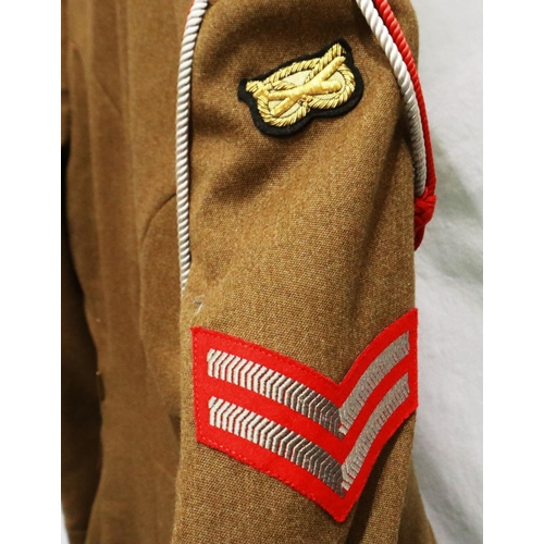 2250 - British dress uniform badged to the rank of corporal, comprising tunic, trousers, shirt, tie and bel... 