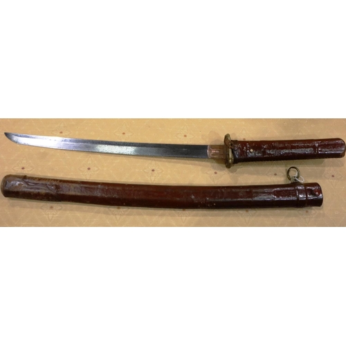 2252 - WWII Japanese Wakizashi short sword with an ancient family blade and crest on the Habaki. The Wakiza... 