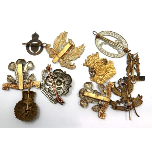 2262 - Ten brass British Army Yeomanry cap badges. P&P Group 1 (£14+VAT for the first lot and £1+VAT for su... 