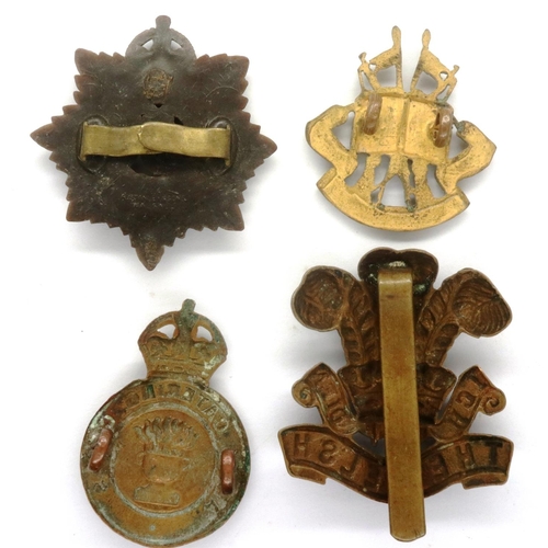 2265 - Four WWII cap badges. P&P Group 1 (£14+VAT for the first lot and £1+VAT for subsequent lots)