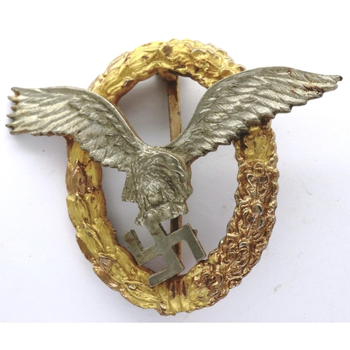 2278 - A Luftwaffe combined pilots/ observer badge, two-part construction marked Schwerin verso. P&P Group ... 