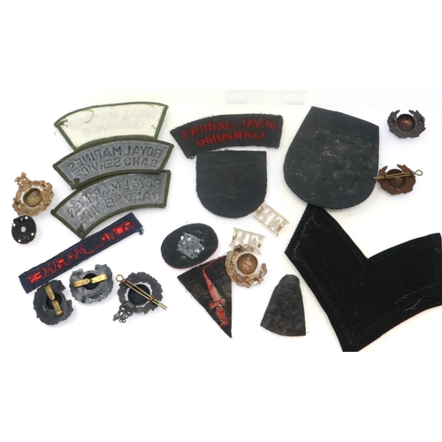 2299 - Twenty Royal Marines badges and insignia. P&P Group 1 (£14+VAT for the first lot and £1+VAT for subs... 