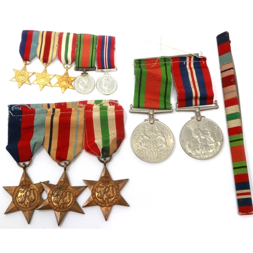 2301 - British WWII medal group, comprising medal pair and three stars, with miniatures and ribbon bar. P&P... 