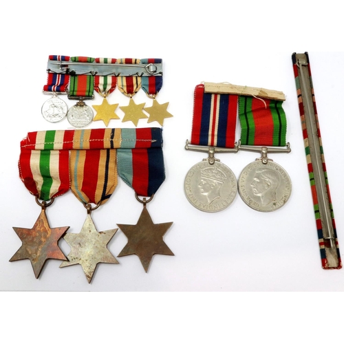 2301 - British WWII medal group, comprising medal pair and three stars, with miniatures and ribbon bar. P&P... 