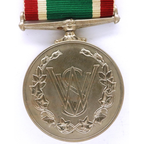 2316 - Womens Voluntary Service medal, Civil Defence Corps enamelled buttonhole and service crested brooch ... 