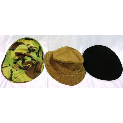 195 - Two American Vietnam war period boonie hats and a Special Forces badged beret (3). P&P Group 2 (£18+... 