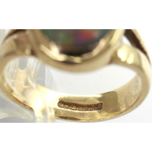 10 - 9ct gold opal set ring, size L, drop 10mm, 4.1g. P&P Group 1 (£14+VAT for the first lot and £1+VAT f... 