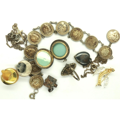 103 - Mixed silver jewellery including a Marcasite set ring, two United Glass buttonholes etc. P&P Group 1... 