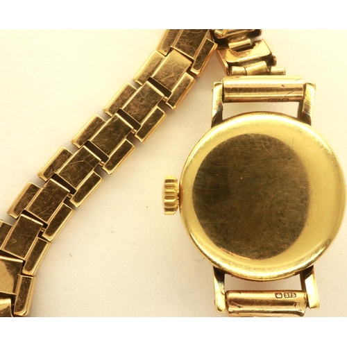 115 - TISSOT: ladies 9ct gold cased mechanical wristwatch on a 9ct gold expanding bracelet, total weight 1... 