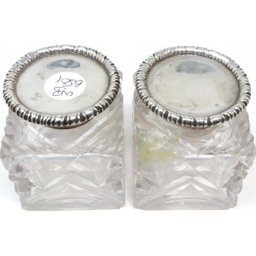 134 - Pair of hallmarked silver topped bottles, large chip to one, H: 70 mm. P&P Group 1 (£14+VAT for the ... 