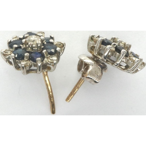 30 - Pair of white gold diamond and sapphire set stud earrings, 1.3g. P&P Group 1 (£14+VAT for the first ... 