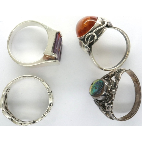 32 - Four 925 silver rings, mixed sizes. P&P Group 1 (£14+VAT for the first lot and £1+VAT for subsequent... 