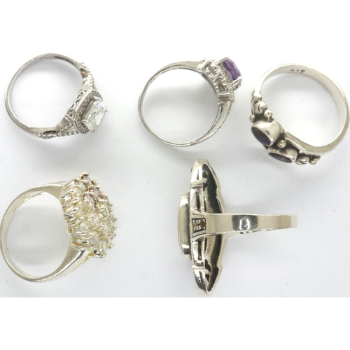 34 - Five silver rings, mixed sizes. P&P Group 1 (£14+VAT for the first lot and £1+VAT for subsequent lot... 