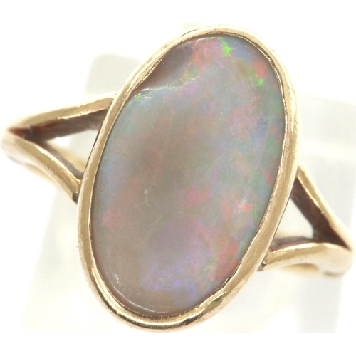 39 - 9ct gold ring set with chipped opal, split shoulders on a full bezel setting, size J/K, 2.3g. P&P Gr... 