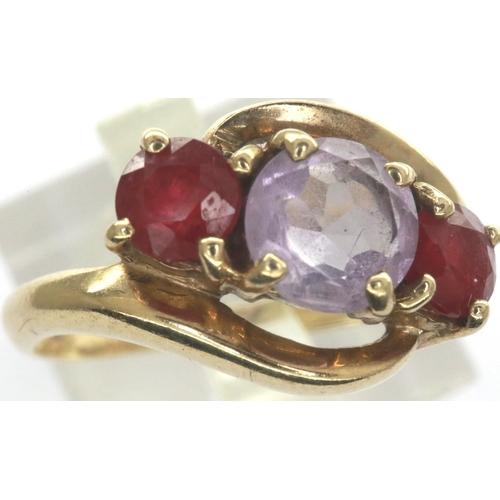 56 - 9ct gold ring with amethyst and rubies, boxed, size N, 2.3g. P&P Group 1 (£14+VAT for the first lot ... 