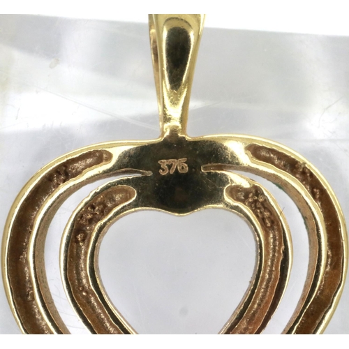 62 - 9ct white and yellow gold twin heart pendant, H: 20 mm, 0.8g. P&P Group 1 (£14+VAT for the first lot... 