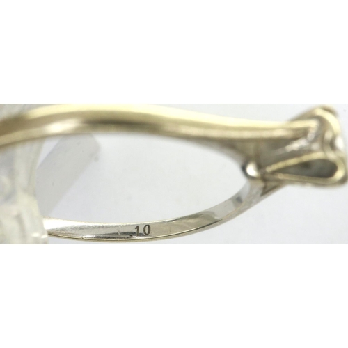 84 - 9ct white gold (unmarked) diamond set solitaire ring, size M, 1.3g. P&P Group 1 (£14+VAT for the fir... 