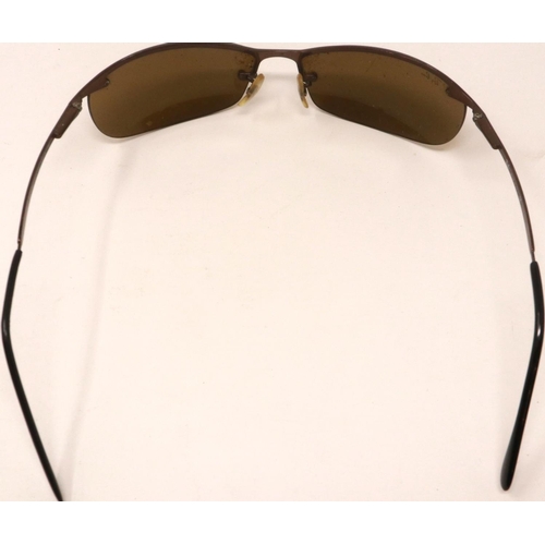 167 - A pair of Ray-Ban sunglasses with black case. Some light scratches to lenses, arms are stretched. P&... 