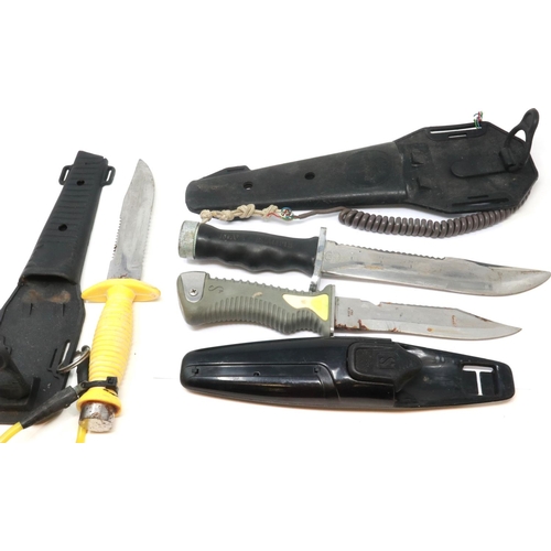185 - Three divers knives, each with sheathes. P&P Group 2 (£18+VAT for the first lot and £3+VAT for subse... 