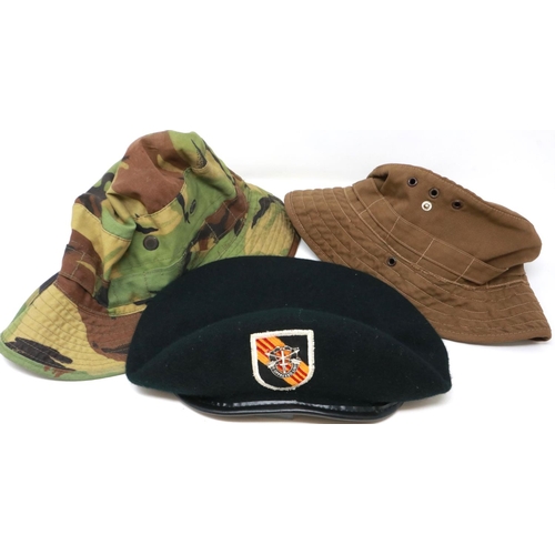 195 - Two American Vietnam war period boonie hats and a Special Forces badged beret (3). P&P Group 2 (£18+... 