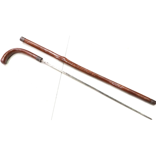 196 - A 19th century sword stick, with tapering square-section blade, overall L: 85 cm, blade L: 54 cm. P&... 