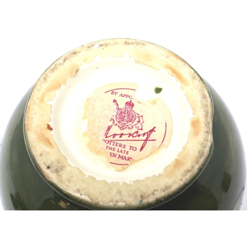 222 - Green ground Moorcroft vase in the Hibiscus pattern, with The Late Queen Mary sticker to base (distr... 