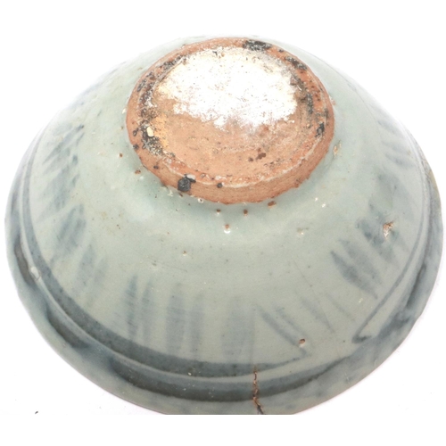 295 - A Ming Dynasty bowl, glazed with blue painted decoration, D: 12 cm, H: 5 cm. Small chips to rim and ... 