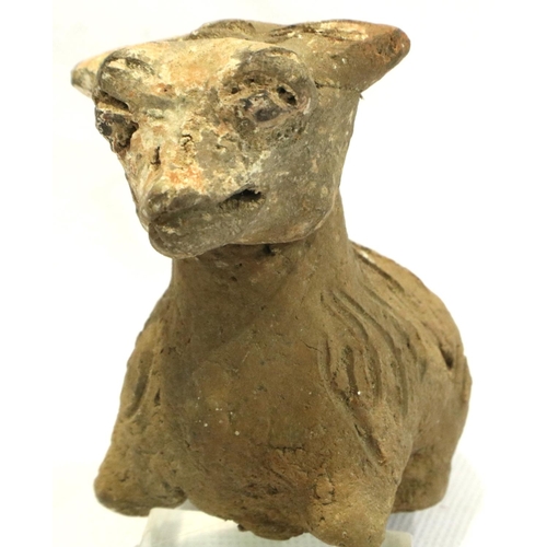 298 - A Han Dynasty zoomorphic clay figure of a recumbent goat, serpent and another beast (3), largest H: ... 