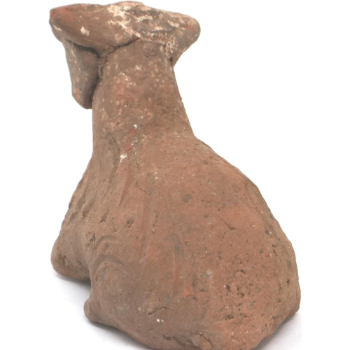 298 - A Han Dynasty zoomorphic clay figure of a recumbent goat, serpent and another beast (3), largest H: ... 