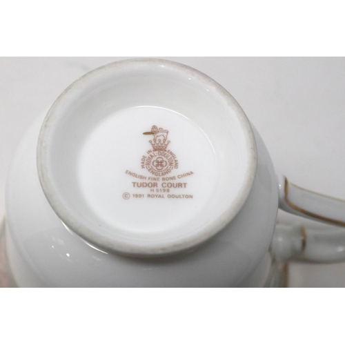 201 - Royal Doulton dinner service in the Tudor Court pattern, of 64 pieces. Not available for in-house P&... 