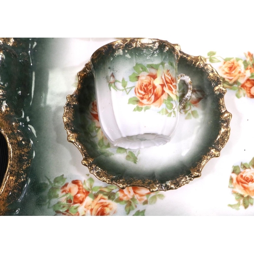 230 - Limoges tea service of eleven pieces. P&P Group 3 (£25+VAT for the first lot and £5+VAT for subseque... 