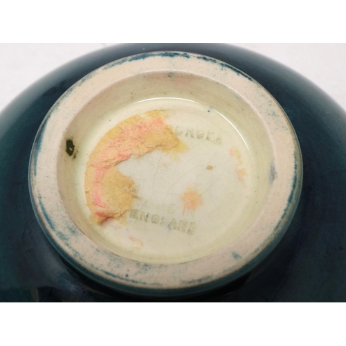 253 - Moorcroft footed bowl in the Iris pattern, D: 11 cm, small chip to rim and heavy crazing throughout,... 