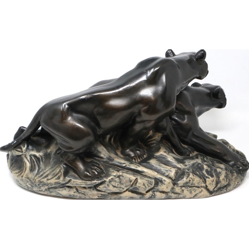 273 - Pair of bronzed spelter cats on a naturalistic base, L: 24 cm. P&P Group 3 (£25+VAT for the first lo... 