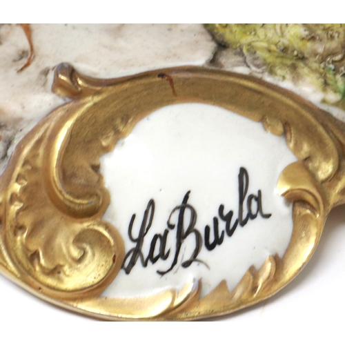 274 - Large Capodimonte figural group, Huck Finn and Tom Sawyer in an apple orchard, signed La Burla with ... 