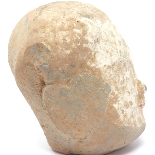 287 - A Han Dynasty figurehead, formed of clay and hollow, H: 10 cm. P&P Group 1 (£14+VAT for the first lo... 