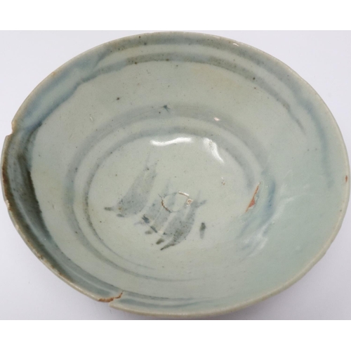295 - A Ming Dynasty bowl, glazed with blue painted decoration, D: 12 cm, H: 5 cm. Small chips to rim and ... 