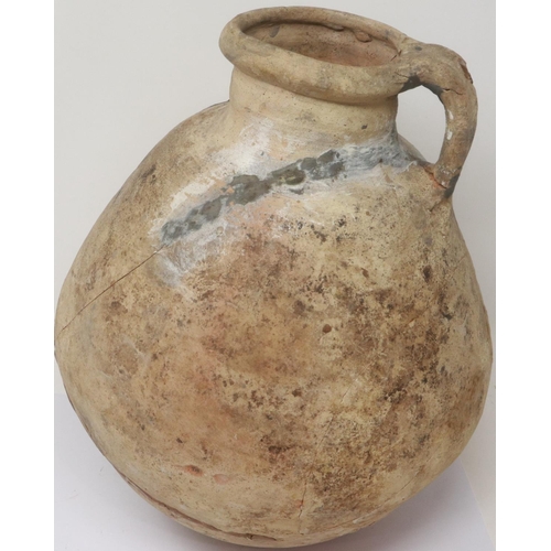 299 - Roman terracotta storage vessel, circa 200-300AD, H: 24 cm . P&P Group 3 (£25+VAT for the first lot ... 