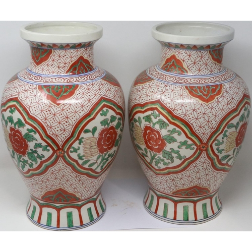 300 - Pair of 19th century Chinese vases, each H: 40 cm, with polychrome decoration, slight wear to paint ... 