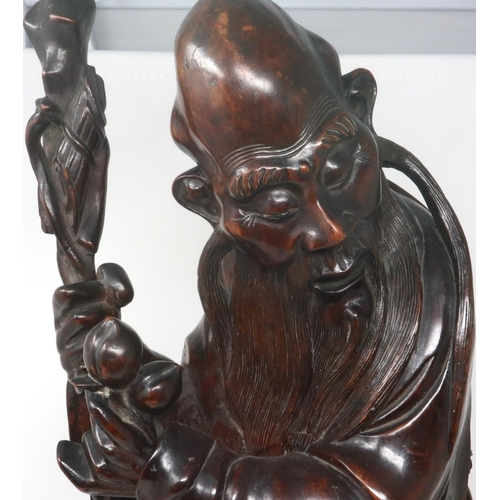 303 - Carved hardwood statue of Shou Lao (Shou Xing) Taoist God of Longevity, standing on a bat, H: 60 cm.... 