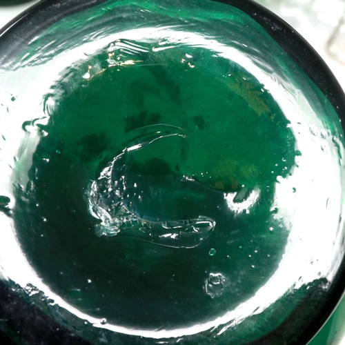 323 - Mary Gregory green glass decanter with enamelled cherub design and three similar examples with match... 